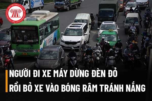 Người lái xe máy dừng đèn đỏ rồi bỏ xe lại vào bóng râm tránh nắng có được không? 