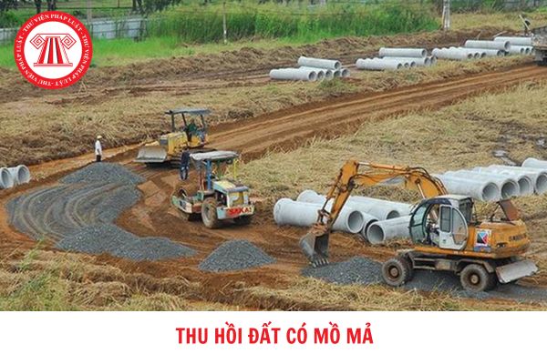 Đất có mồ mả thì có bị thu hồi đất không? Mồ mả trong phạm vi đất thu hồi phải di dời mà không có người thân thì xử lý như thế nào?