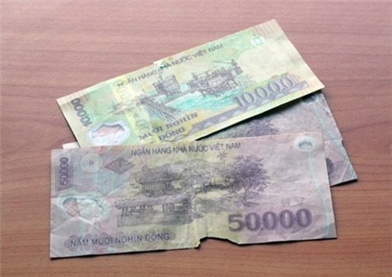 Hướng dẫn đổi tiền không đủ tiêu chuẩn lưu thông mới nhất 2026